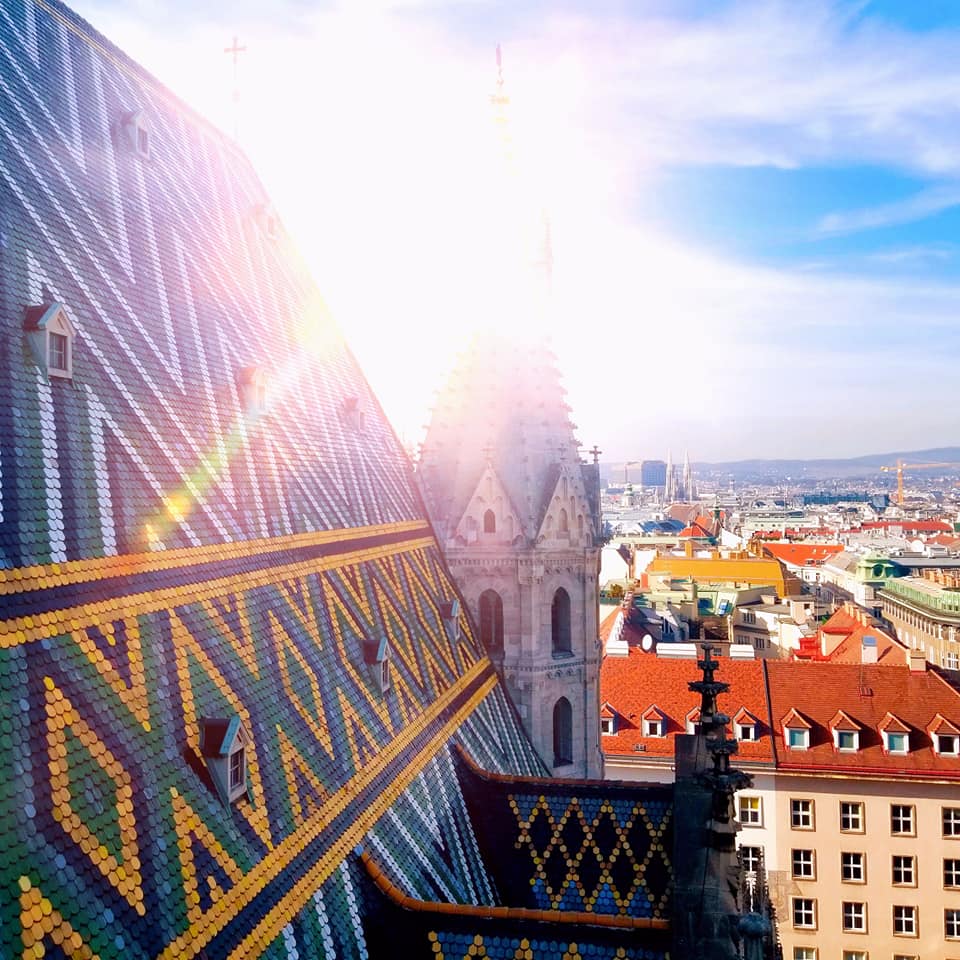 Sun glaring on the tiled roof of St. Stephen's Cathedral in Vienna.