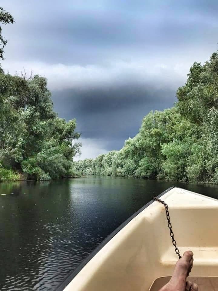 Stormy skies over the Danube river in Danube Delta, Romania