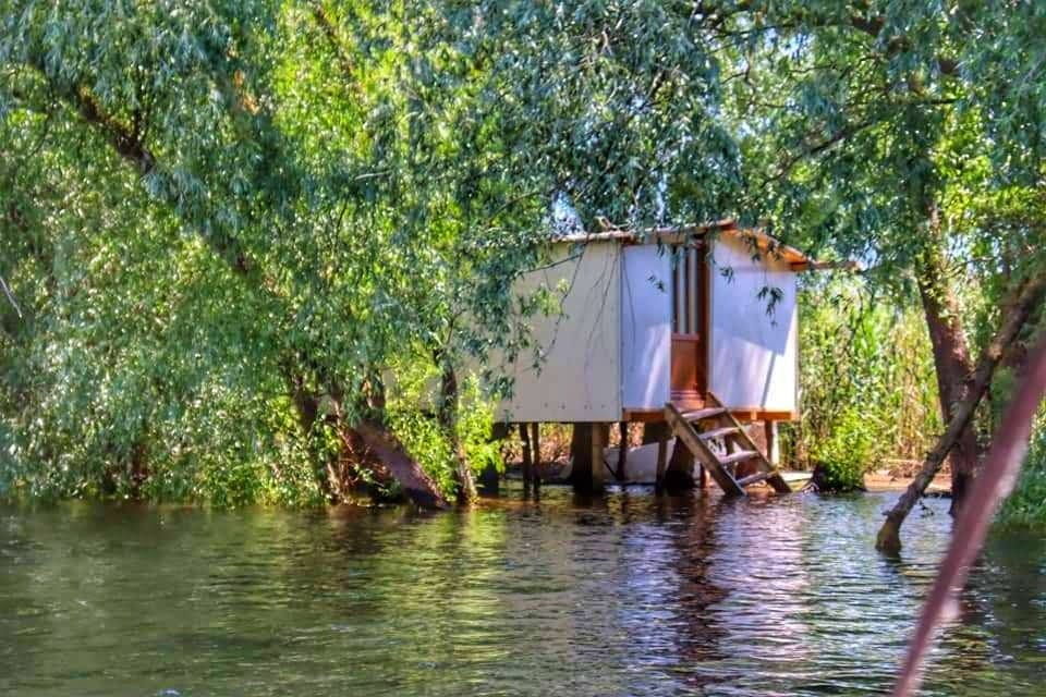 Raised hut above the water at the Danube Delta, Romania