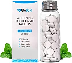 Jar of whitening toothpaste tablets for traveling without liquids.