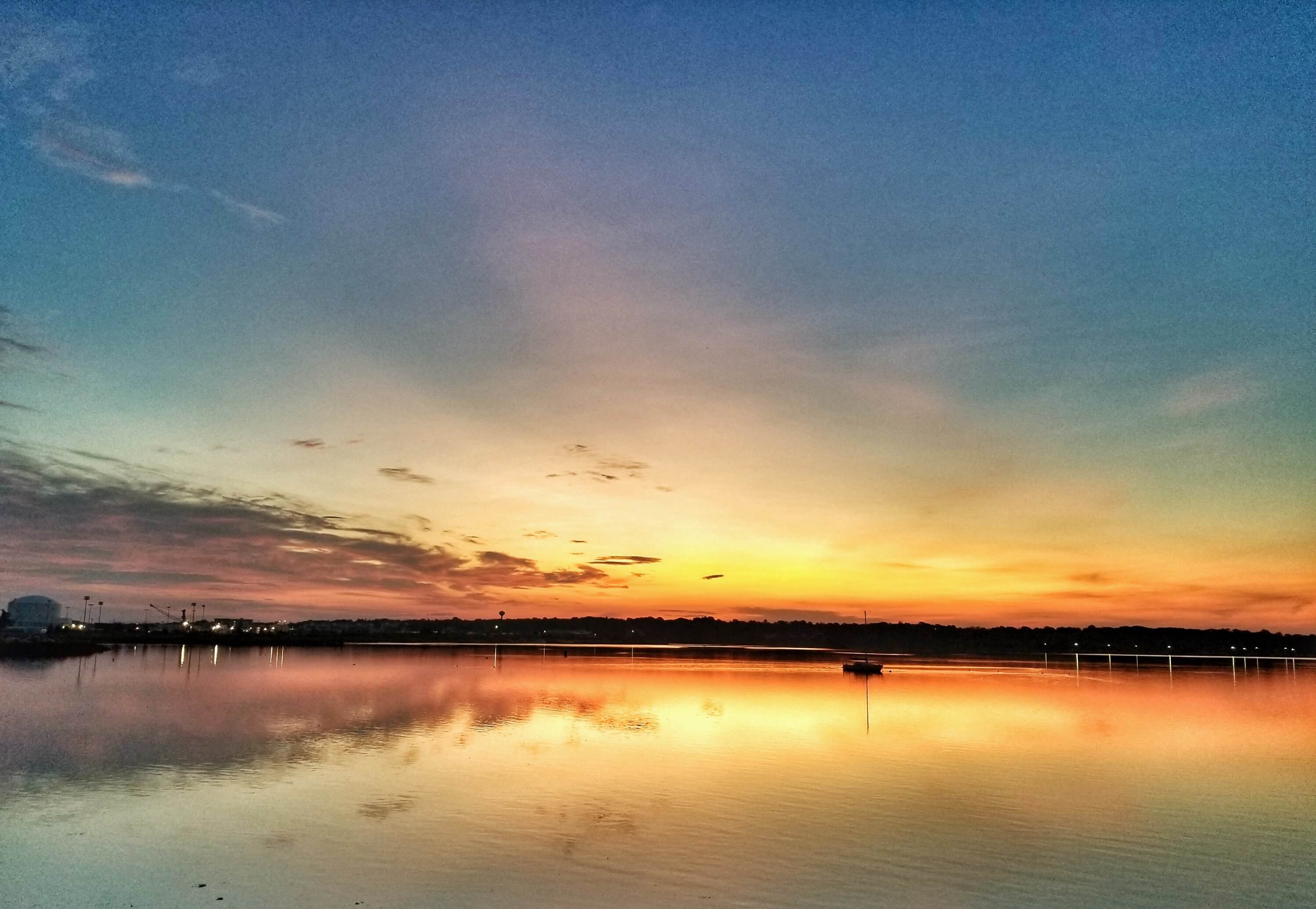 sunrise over the providence river in rhode island